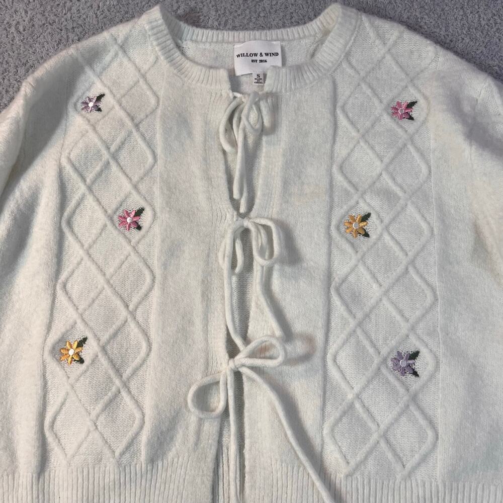 Wind and Willow NWT size small. Cable knit design with delicate tie front.